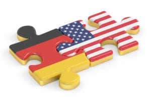 USA and Germany puzzles from flags, relation concept. 3D renderi