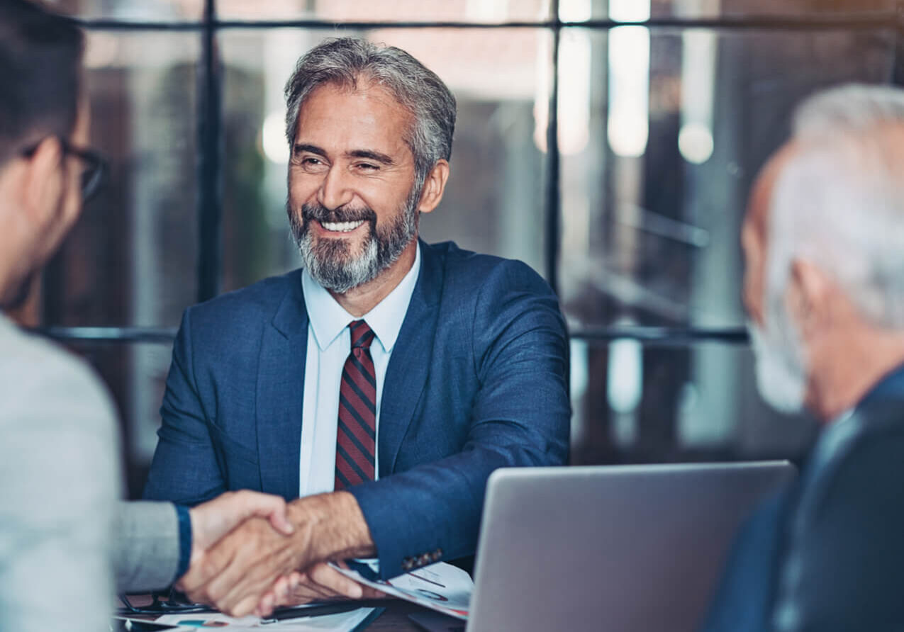 Businessmen handshake in the office